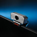 HD webcam clipped on top of laptop screen for professional video calls in 2026