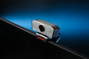 HD webcam clipped on top of laptop screen for professional video calls in 2026