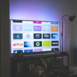 Multiple streaming service apps displayed on a large smart TV screen in 2026