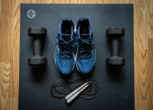 Best home gym equipment including dumbbells and smart fitness devices in a modern home gym in 2026