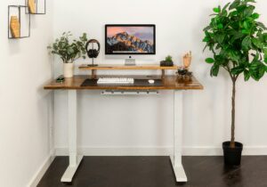 Best standing desk raised to standing height in a clean modern home office in 2026