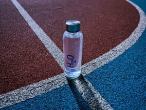 Best smart water bottle sitting next to gym equipment during a workout in 2026