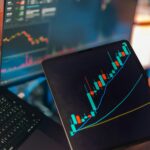 Best financial planning tool displaying retirement projections and charts on a laptop in 2026