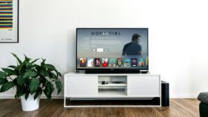 Large smart TV on a stand for home entertainment in 2026
