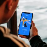 Best workout app displayed on a smartphone during a home training session in 2026