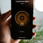 Smart lighting system casting warm colorful light in a modern living room in 2026