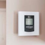 Best Smart Thermostats in 2026 — thermostat on wall